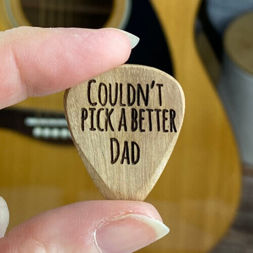 Custom guitar picks engraved with a popular saying for Dad.