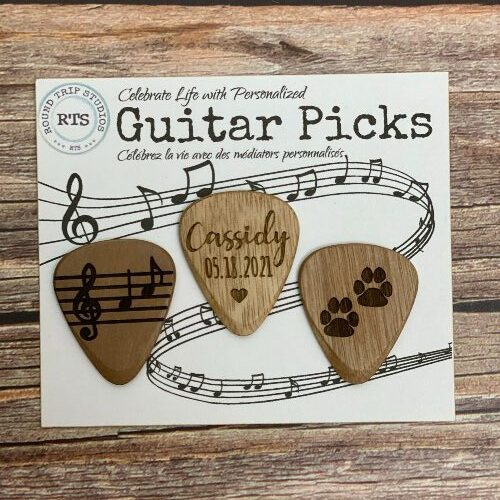 Pack of 3 personalized guitar picks, each with a different saying.