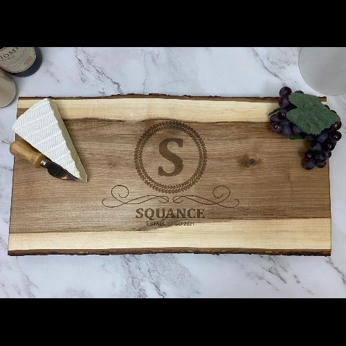 Personalized charcuterie board, made in Canada, with initial, name and date engraved in the center.