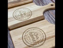 Many paddle style cutting boards with Tuscan our home design personalized to different clients.