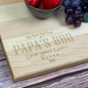 Custom cutting board with a design engraved for guys that love to BBQ!