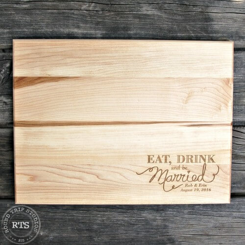 Eat, drink & be married, with personalization, engraved on a cutting board.