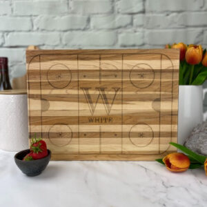 This cutting board is on sale because the engraving is off centered.