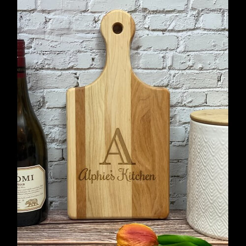 Personalized gifts for friends or clients. Cutting boards engraved with an initial and a name.
