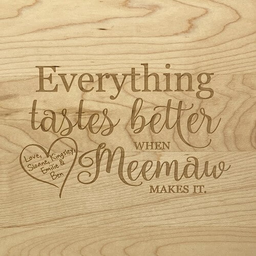 Engraved cutting board gifts for Grandma with grandchildren's names engraved in the heart.