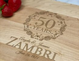 Engraved cutting board, made in Canada, with the name, wedding date and design celebrating a milestone anniversary.