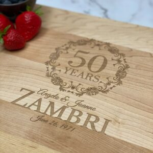 Engraved cutting board, made in Canada, with the name, wedding date and design celebrating a milestone anniversary.