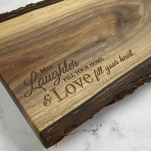 Grazing board with engraving in the corner, perfect for a housewarming gift.
